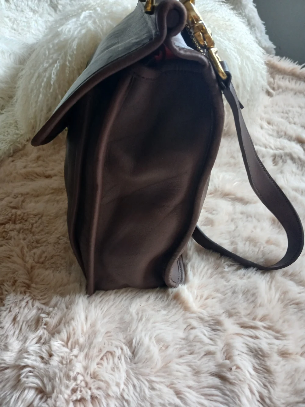 Classic Brown Leather Messenger Bag with Gold Hardware Coach.